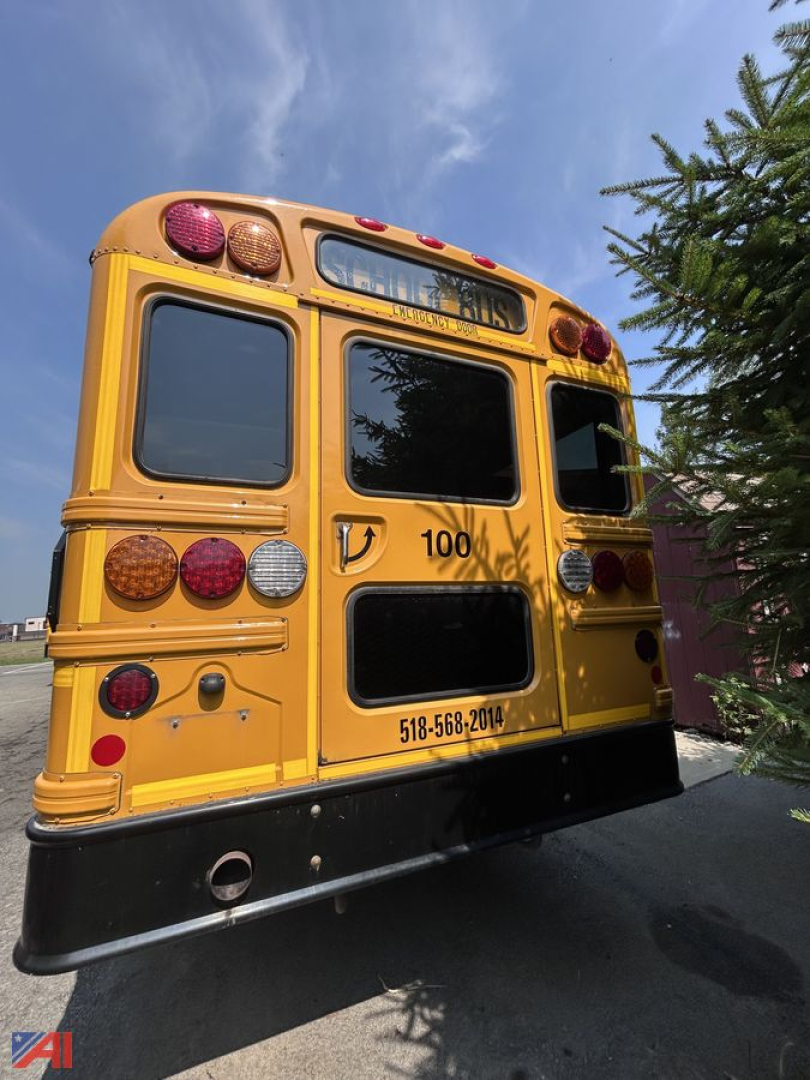 IC Corporation CE series school bus rear view showing multiple warning lights and bus numbers