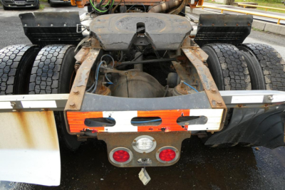 Freightliner Cascadia 125 rear chassis view showing hitch assembly and dual rear wheels with mud flaps.
