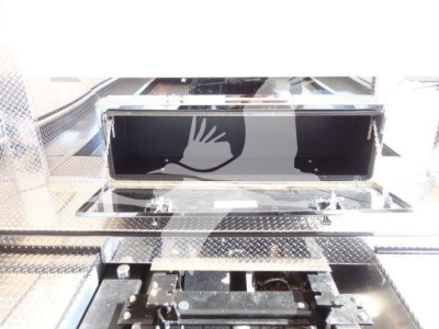 MD6 Mack rollback truck component image showing a polished diamond-plate tread area and a storage toolbox lid mounted on the chassis.