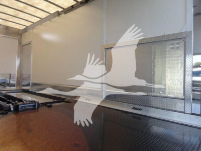 MD6 rollback truck trailer interior with metal diamond plate entry, platform, and storage area.
