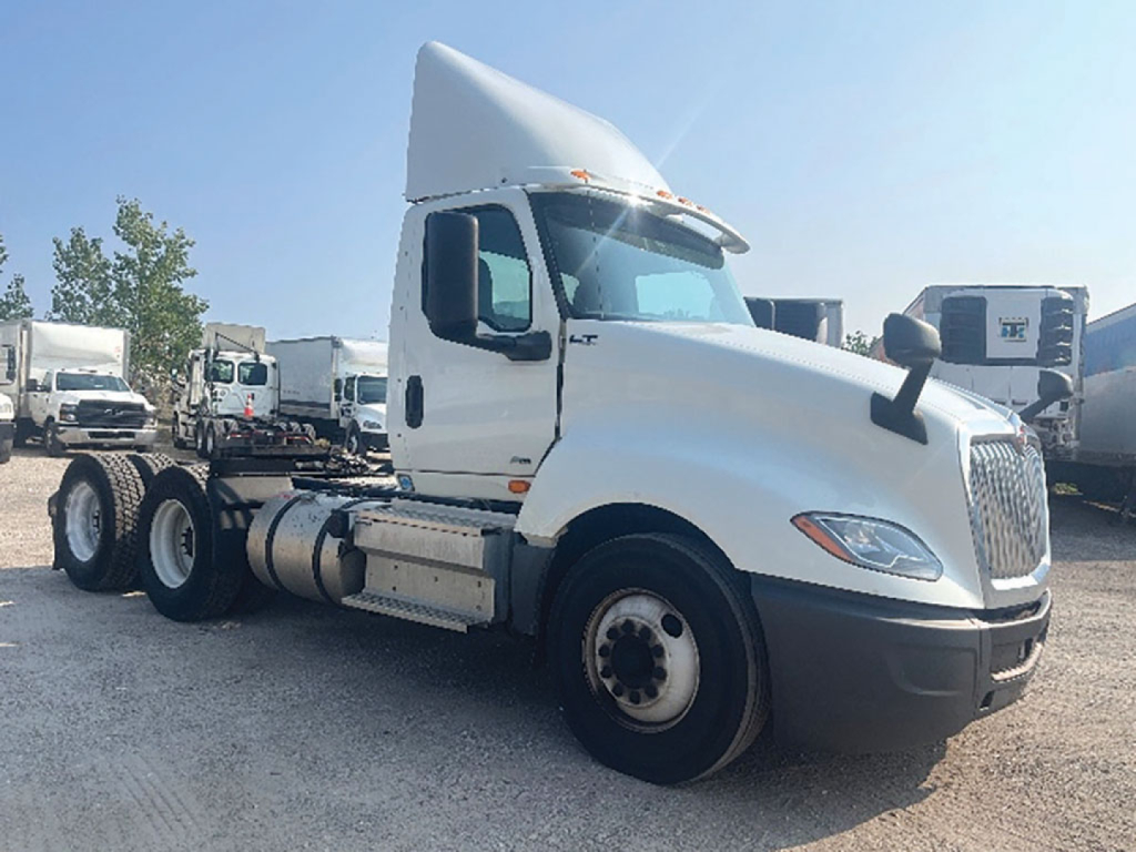Truck with LT badge in idle position, cab and hood visible; no readable labels or fluid specs visible on the image.