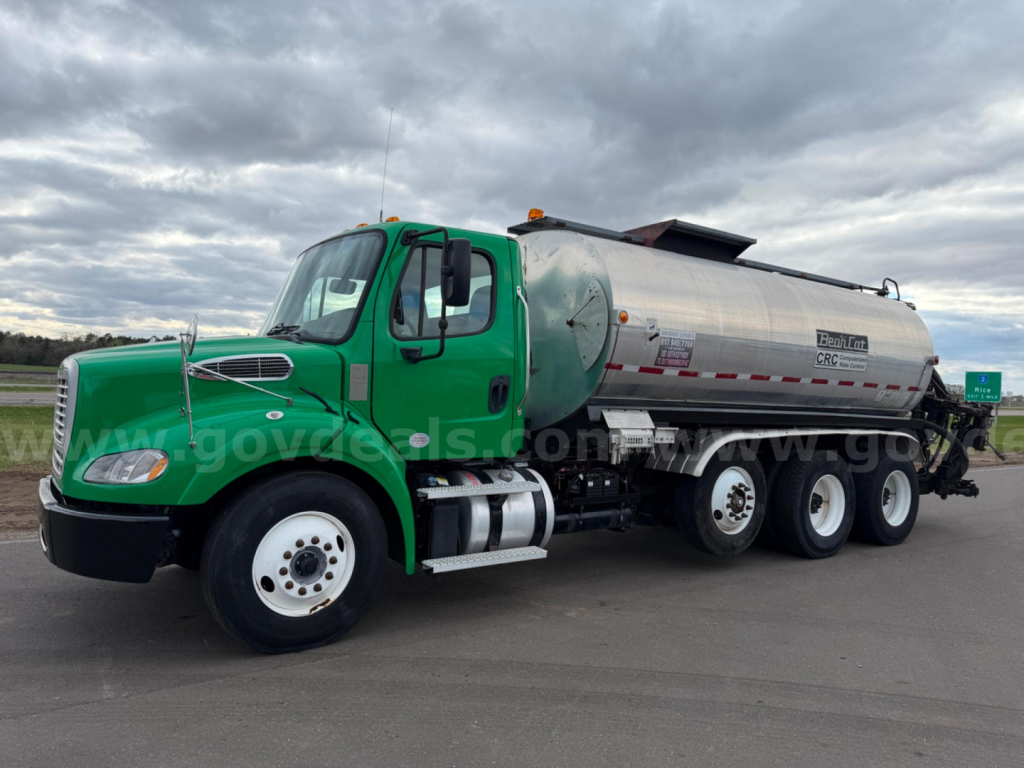 Truck: 2021 Freightliner Bearcat vacuum tank/semi-trailer combo (green cab, silver cylindrical tank) showing side view with wheels and tank markings.