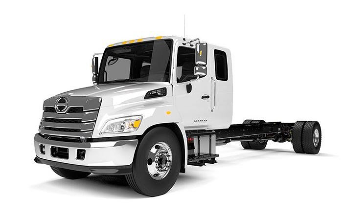 Truck chassis cab showing front view of a white 2027 Hino L6 cab chassis with left-side door and blank rear chassis.