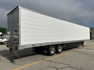Trailer side view of a new 2027 Utility Reefer refrigerated trailer with silver aluminum panels, dual rear doors, triple axle, and black chassis.