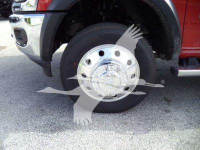 Ram 4500 front wheel close-up showing steel wheel with hubcap and tire, front fender, and part of bumper; watermark graphic over image.