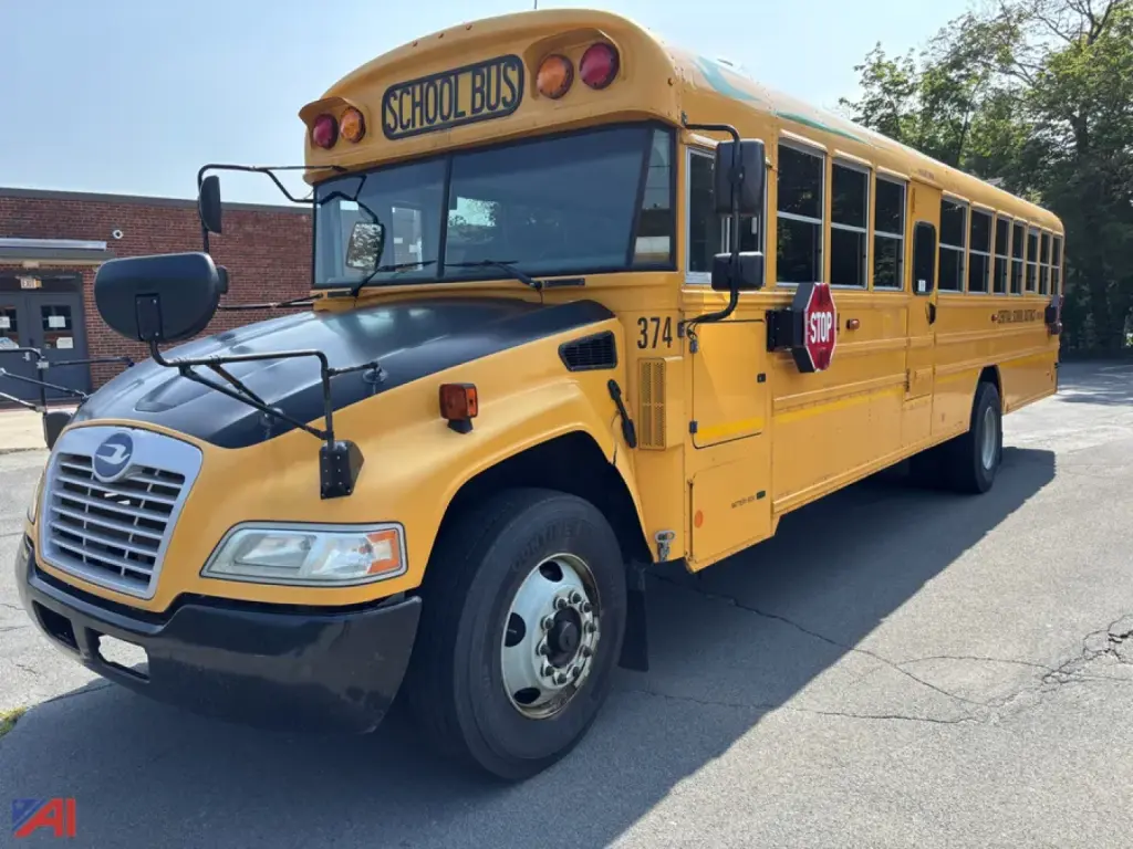 School bus in service showing front and side views with yellow body and stop sign extended.