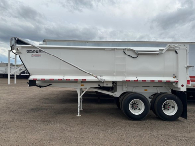 Ranco Elliptical Tub Quarter Frame Steel Rock End Dump trailer showing side view with wheelset and support leg.