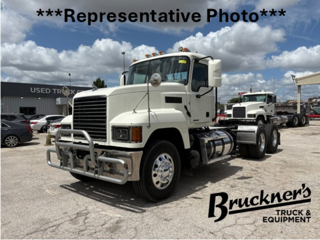 Truck: 2020 Mack PI64T conventional daycab in-service with front bull bar, dual rear axles, white cab, chrome mirrors, and fuel tanks visible.