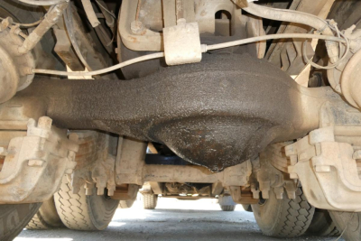 Mack RD688S rear underside showing differential housing and suspension components.