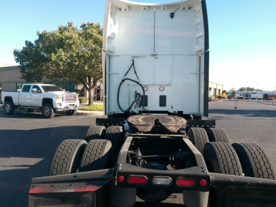 Peterbilt 579 truck rear view showing fifth wheel and dual rear axles with tires