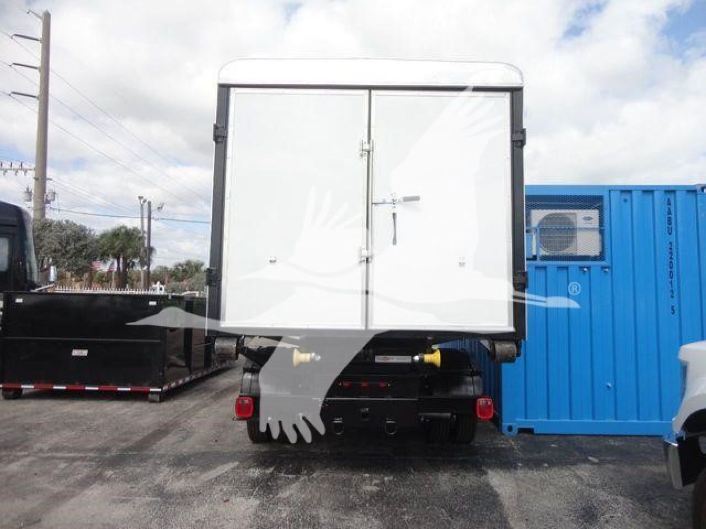 Ram 5500HD rear view showing cargo box doors and hitch