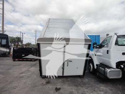 Ram 5500 HD truck with a roll-off body front view; no legible labels visible