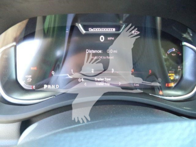 Ram 5500 interior digital gauge cluster showing 0 mph, 0.0 distance, and various dashboard indicators.