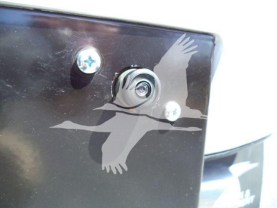 Ram 5500 winch truck part showing bolt and sticker with a flying gull silhouette graphic.