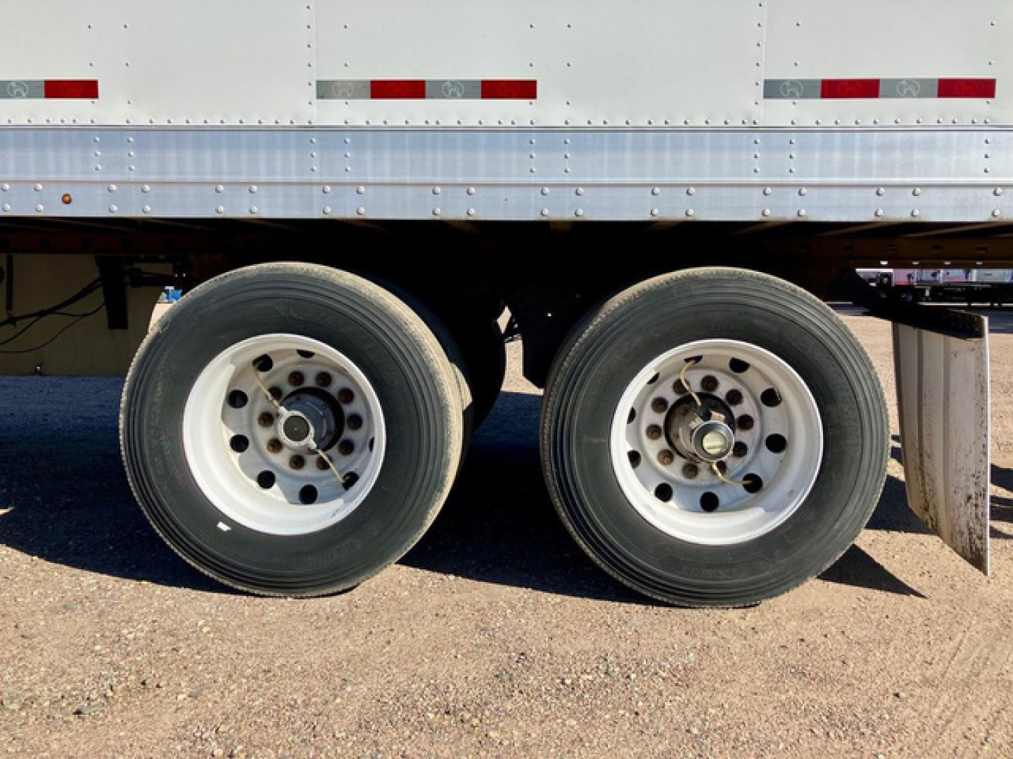 Trailer wheel area of a 2020 Great Dane dry van showing tandem axles and dual wheels.