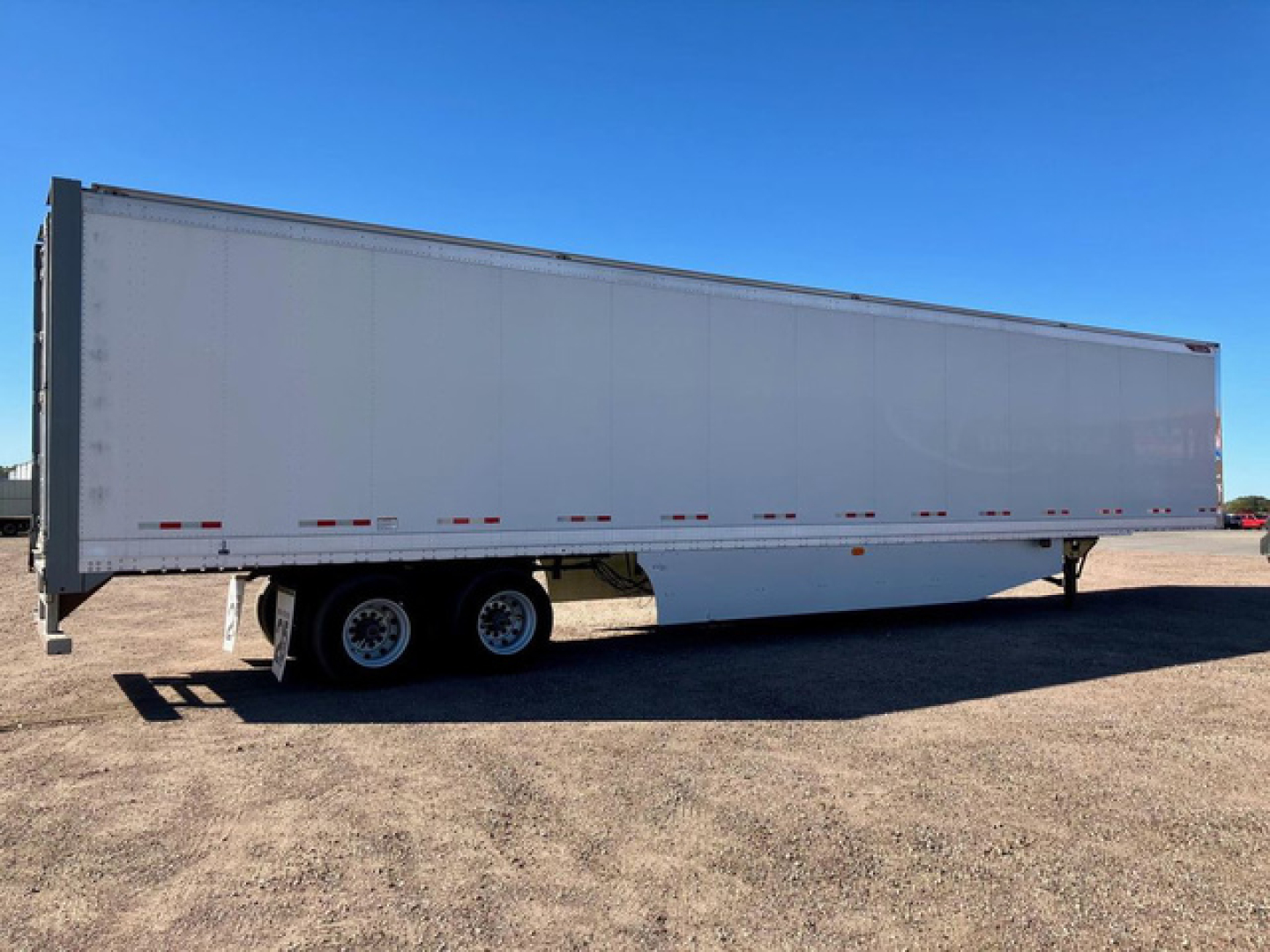 Great Dane 2020 dry van trailer side view showing white exterior and dual-axle rear with tandem wheels.