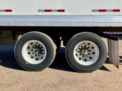 Trailer wheel area of a 2020 Great Dane dry van showing tandem axles and dual wheels.