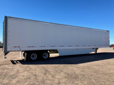 Great Dane 2020 dry van trailer side view showing white exterior and dual-axle rear with tandem wheels.