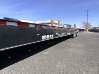 Landoll 440B-53 40-ton traveling axle lowboy trailer side view with brand markings.
