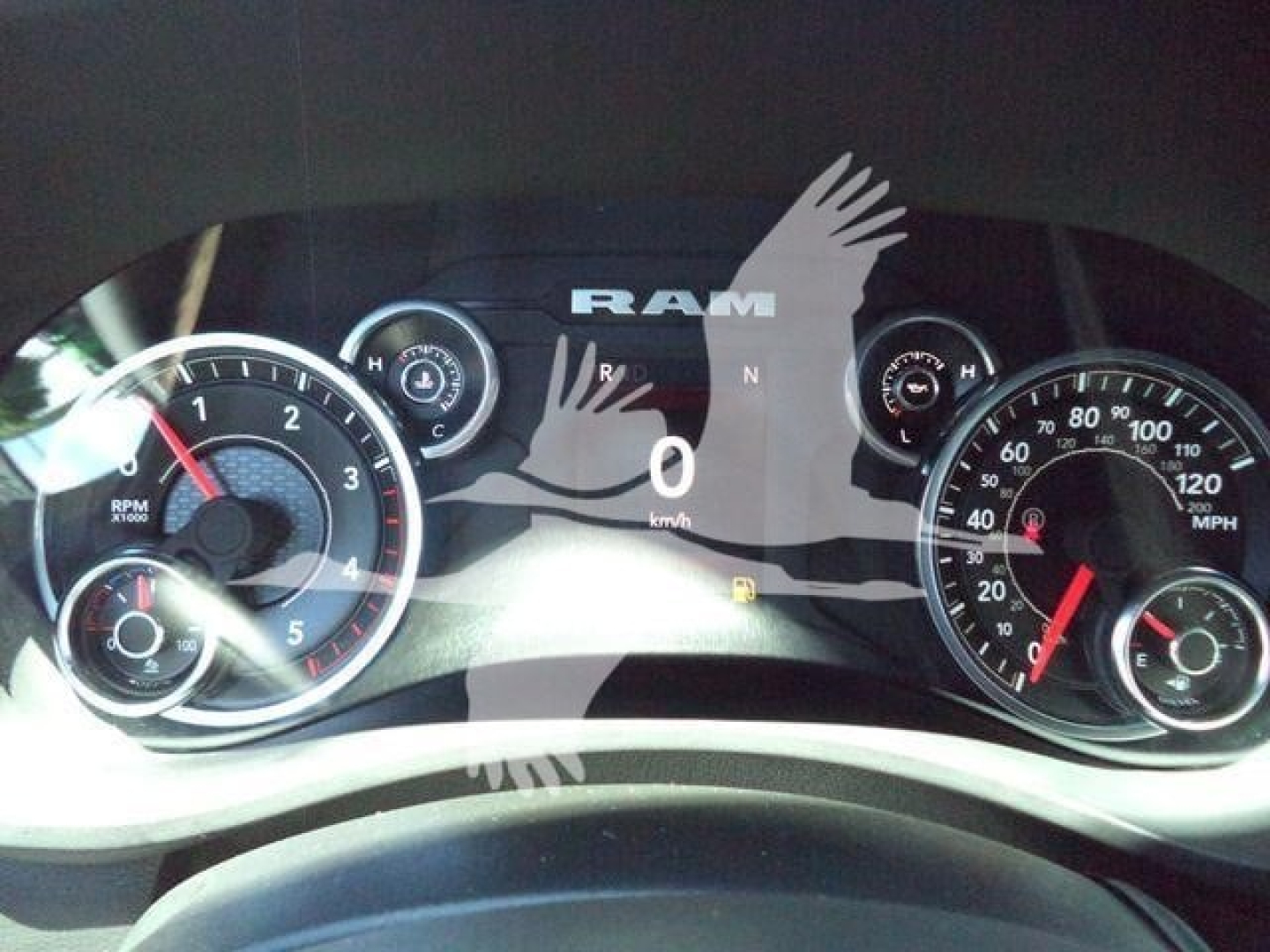 Dashboard of 2024 Ram 5500 SLT showing speedometer and tachometer with 0 km/h, brand RAM.