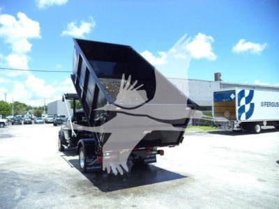 Ram 5500 dump bed in raised position attached to truck chassis; no visible labels or serial numbers readable on the surface.