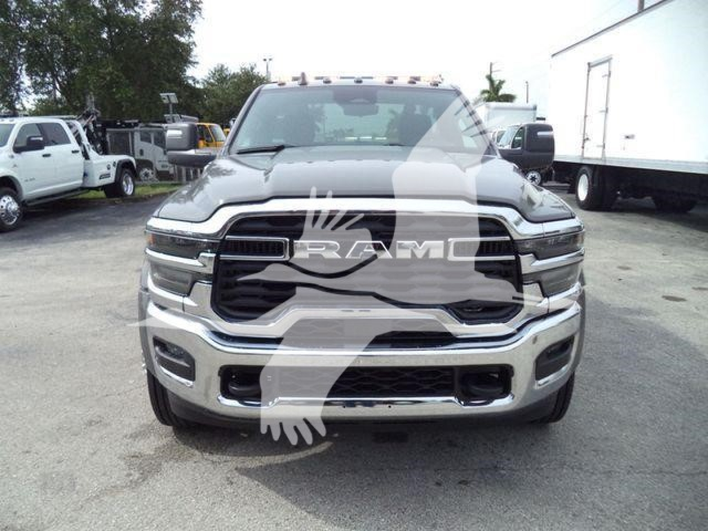 Front view of a 2026 Ram 5500 Big Horn pickup truck with chrome grille and bumper, RAM emblem, and large front fascia.