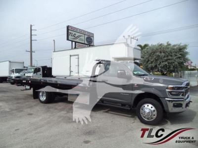 Ram 5500 rollback truck side view with flatbed and dual rear wheels, 2026 Big Horn, gray exterior, TLC Truck & Equipment watermark
