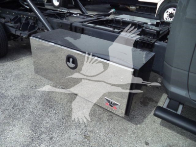Ram 5500 rollback truck toolbox with JPRO logo and side emblem, mounted under truck bed, showing polished metal rectangular toolbox.