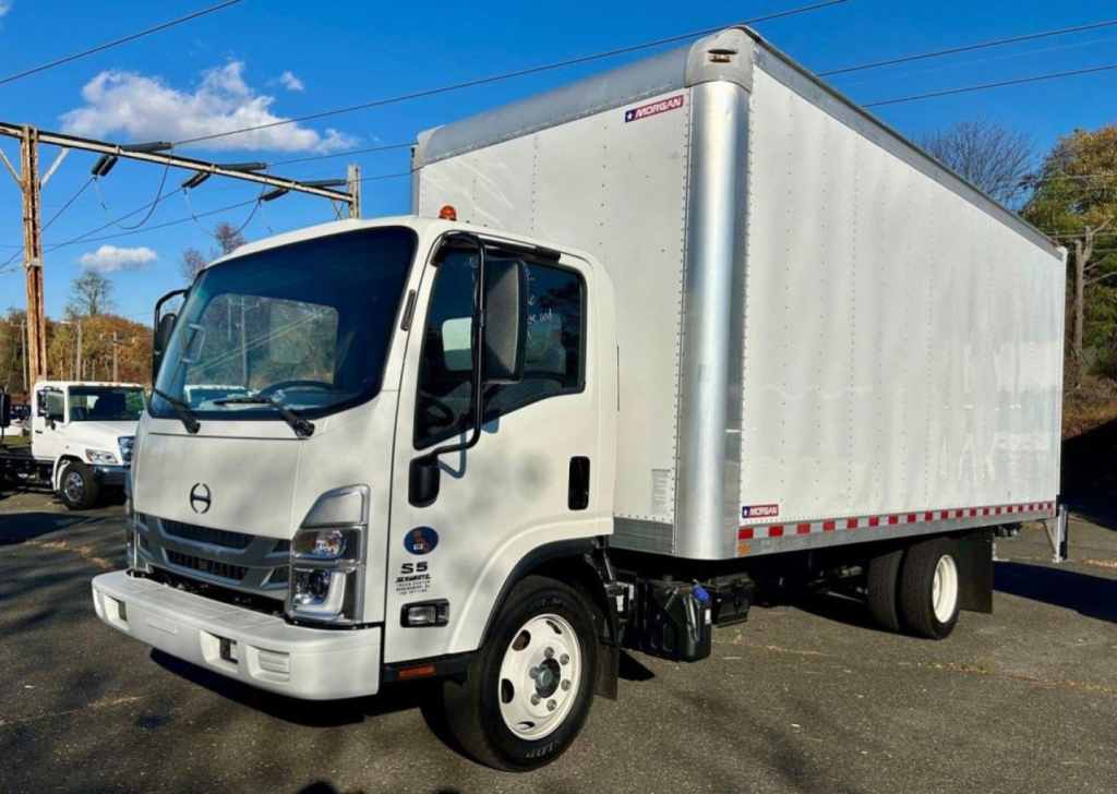 Hino S5 box truck showing cab and cargo box with white exterior and black front grille.