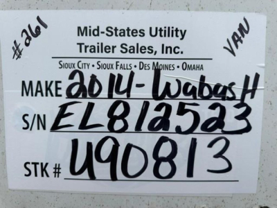 Trailer tag with handwritten VIN, stock number, and make information on a Wabash trailer. Text: Mid-States Utility Trailer Sales, Inc. Make 2014-Wabash; S/N EL812523; STK # 490813; S/O numbers handwritten.