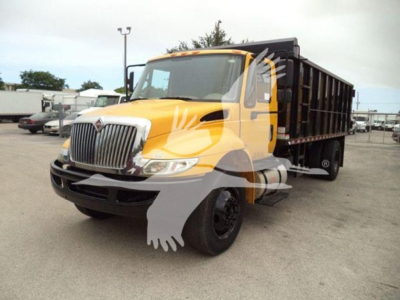 Dump truck front-left view, 2019 International Durastar 4300 with yellow cab and black dump bed, visible grille, headlights, and side mirrors.