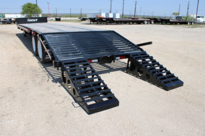 DUMP VALVE TO LOWER TRAILER REAR AND SIT ON THE RAMPS