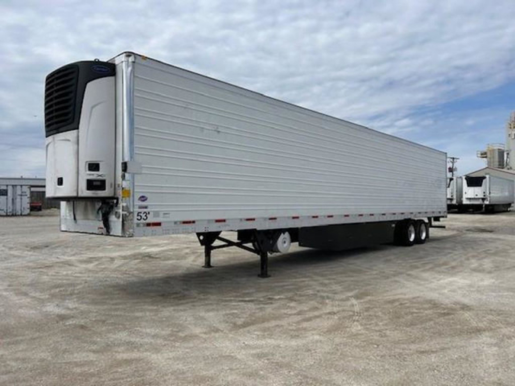 Utility reefer trailer with silver aluminum siding and front refrigeration unit; 53' long, tandem axles, landing gear down, stock number KTS1914.