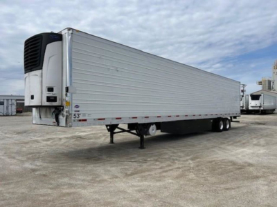 Utility reefer trailer with silver aluminum siding and front refrigeration unit; 53' long, tandem axles, landing gear down, stock number KTS1914.