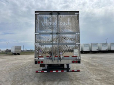 Trailer rear view of a 2019 Utility Reefer with diamond plate doors, emergency doors, and taillights; stock number KTS1914; VIN 1UYVS2533K2613804.
