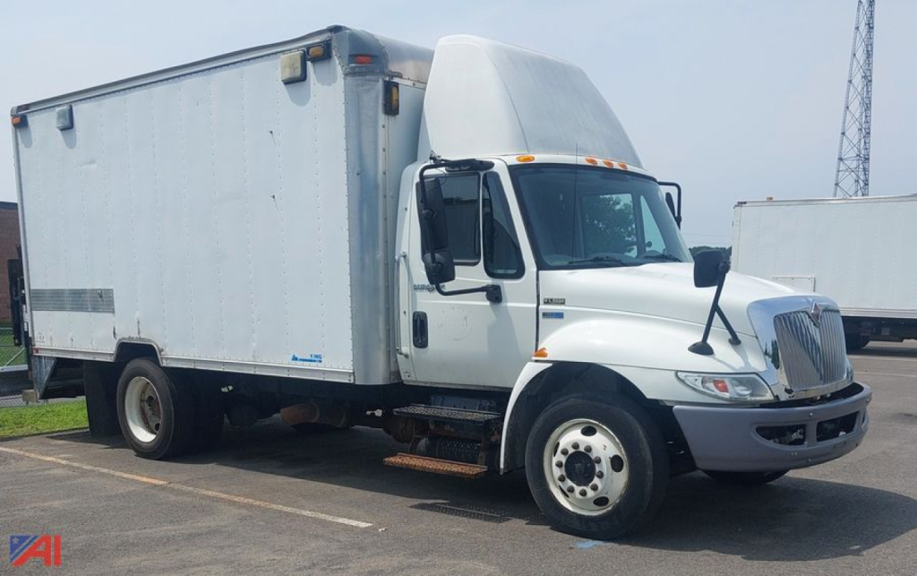 Box truck from side showing International DuraStar 4300 cab and box