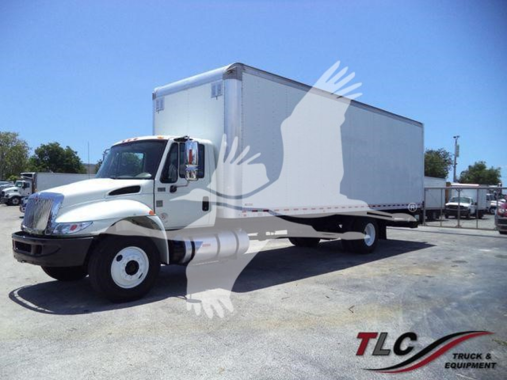 Box truck (2019 International Durastar 4300) in-service with a large box body and white cab, showing stock number T33961FM.