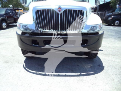 Truck front view showing grille and bumper of a 2019 International Durastar 4300 in a dealership lot.