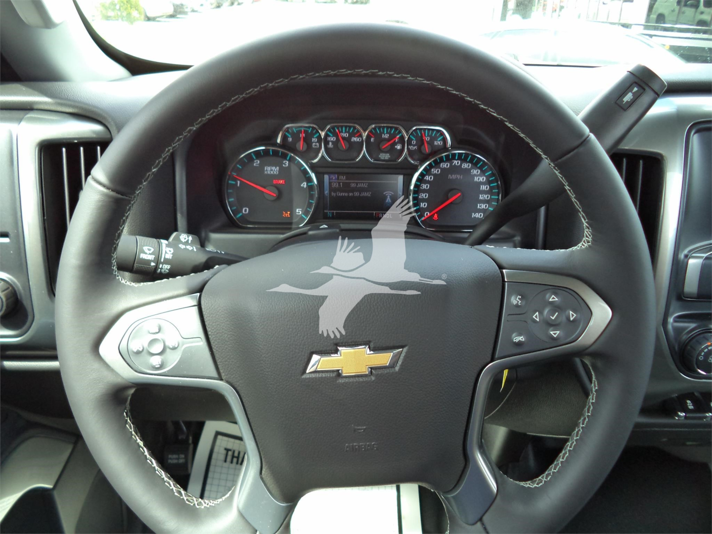 Chevrolet Silverado 6500HD steering wheel and dashboard interior with gauges visible