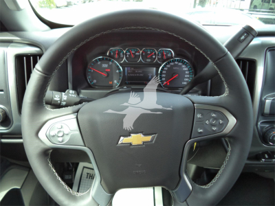 Chevrolet Silverado 6500HD steering wheel and dashboard interior with gauges visible