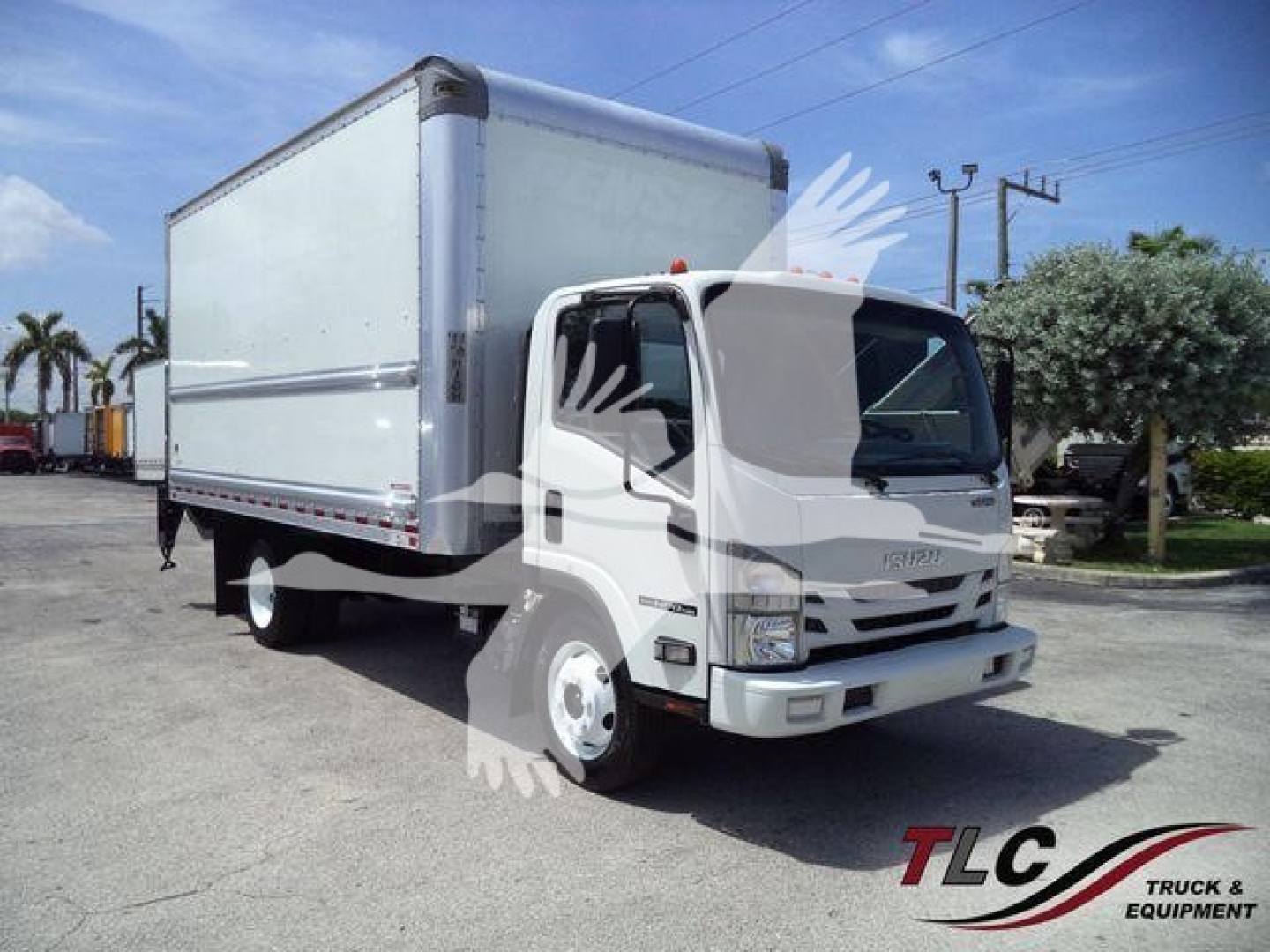 Isuzu NPR HD box truck showing side of cargo box and cab with blank white exterior.