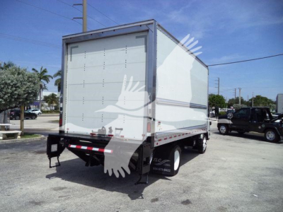 Isuzu NPR-HD box truck rear view showing cargo box and dual rear wheels.