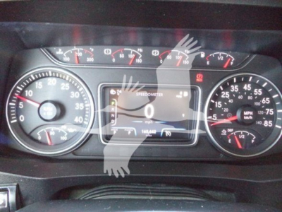 Dashboard of a 2022 International MV showing speedometer, tachometer, and digital display reading 0 mph with various gauges.