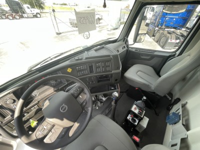 Volvo VHD86B300 cab interior showing dashboard steering wheel and instrument panel.