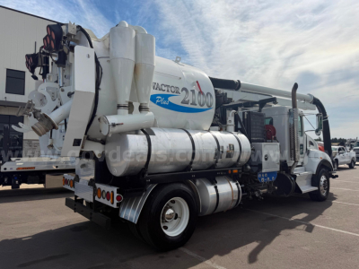 Kenworth T470 Vactor vacuum truck showing Vactor 2100 Plus branding and vacuum tanks