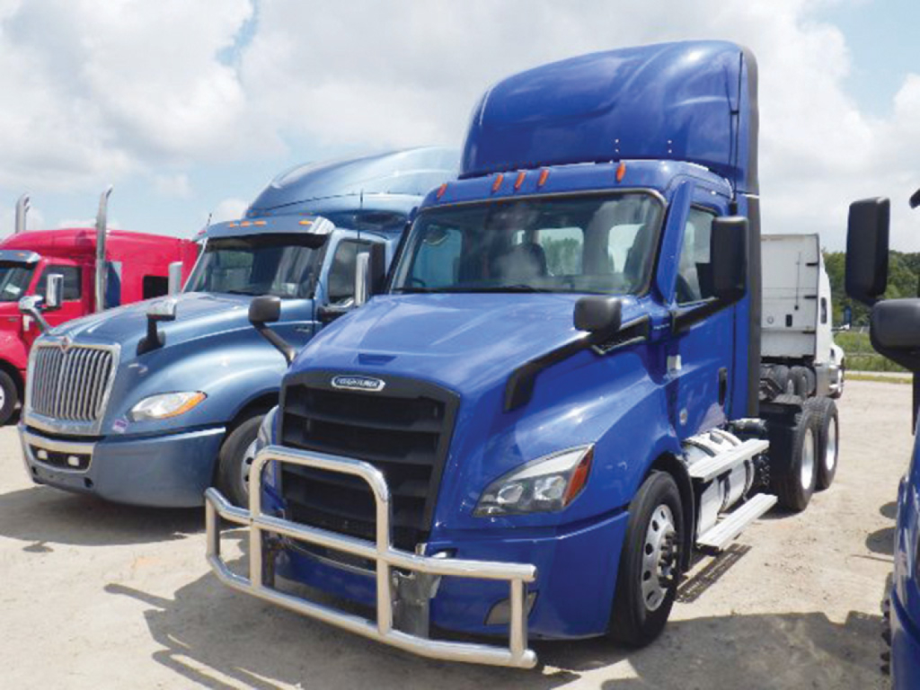 Freightliner Cascadia1240 showing blue tractor cab with front bull bar and raised sleeper area.