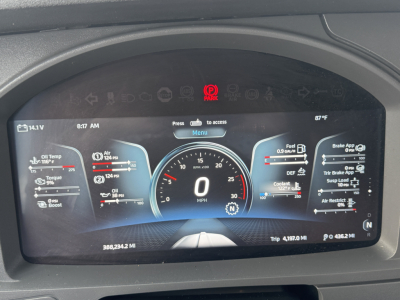 Dashboard display of 2024 Kenworth T680 showing digital gauges and vehicle data.