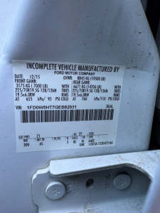 Label on a Ford F-550 showing vehicle data: INCOMPLETE VEHICLE MANUFACTURED BY FORD MOTOR COMPANY, VIN: 1FD0W5HT7GEB82931, FRONT GAW? 3175 KG (7000 LB) with? 225/70R19.5 G179?  on rear 225/70R19.5? LBS. GVRW 8845 KG (19500 LBS). TIRE COLD P