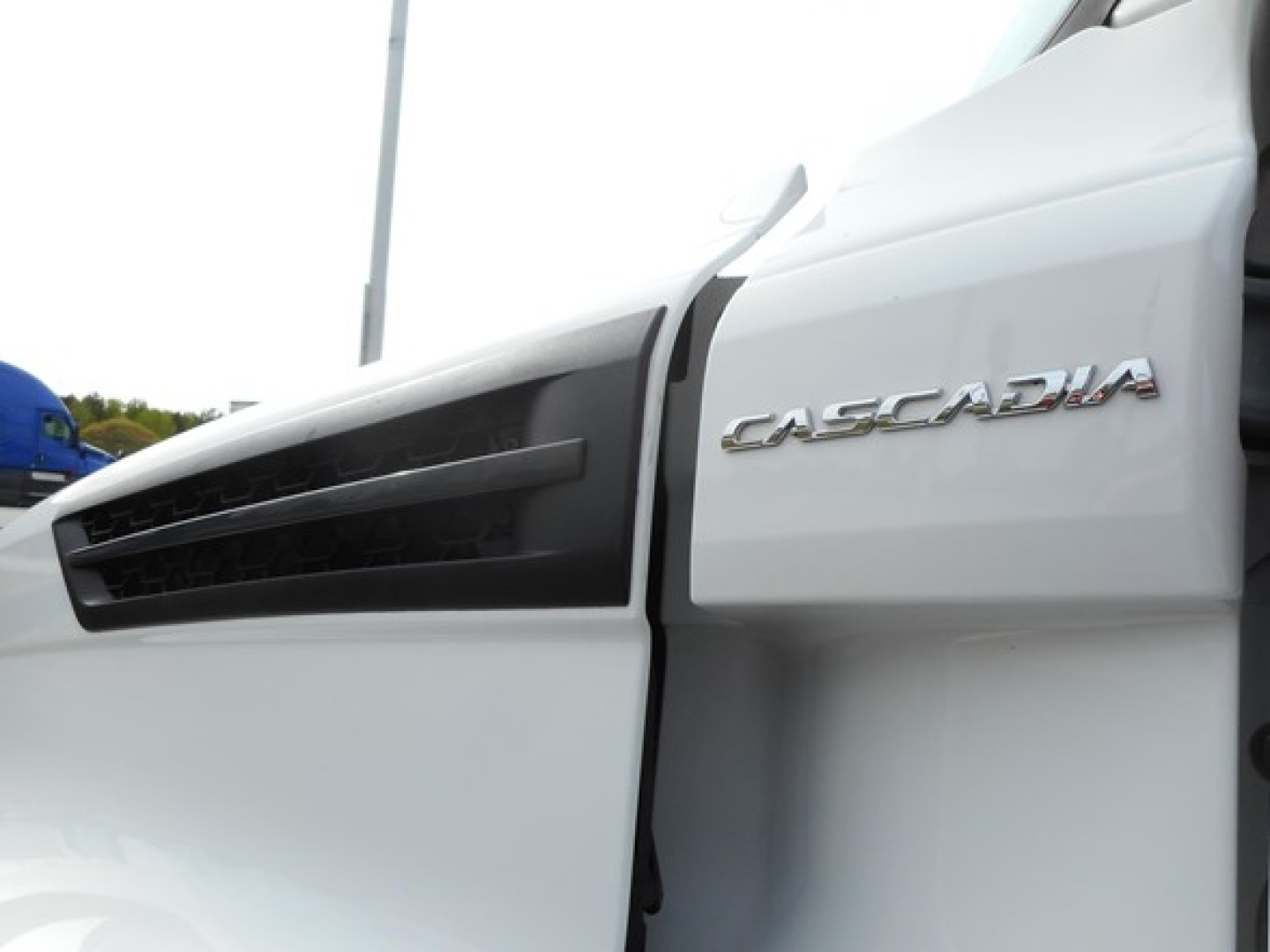 Cascadia badge on a Freightliner Cascadia 126 truck cab