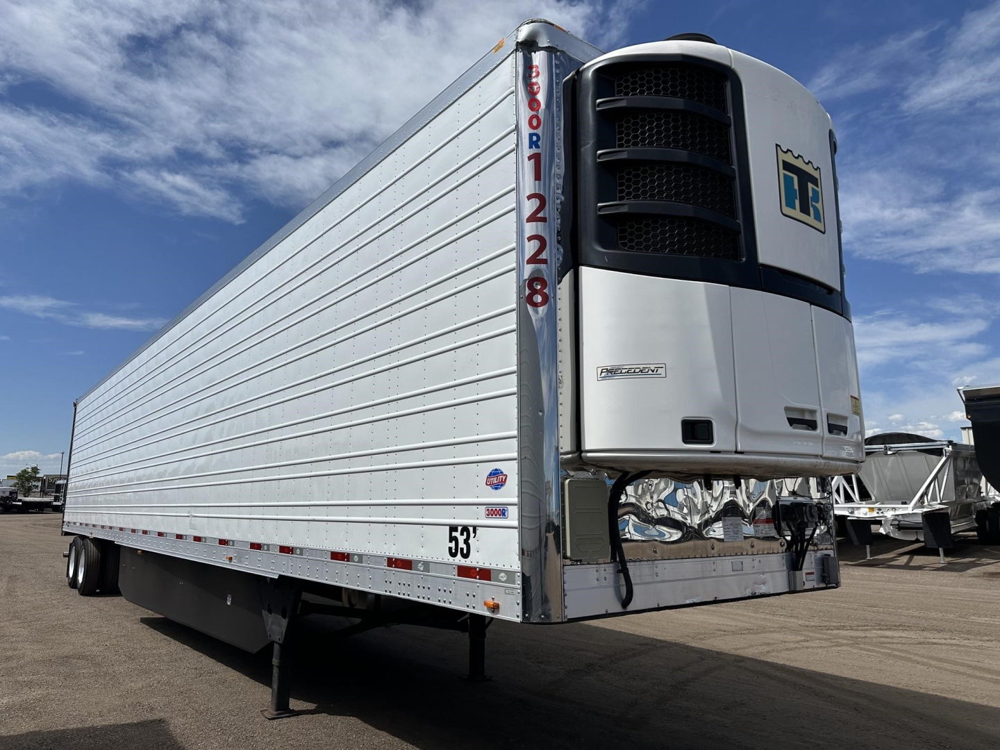 Utility 3000R reefer trailer showing front refrigeration unit and side rails, VIN 150120728194, stock UE11628.